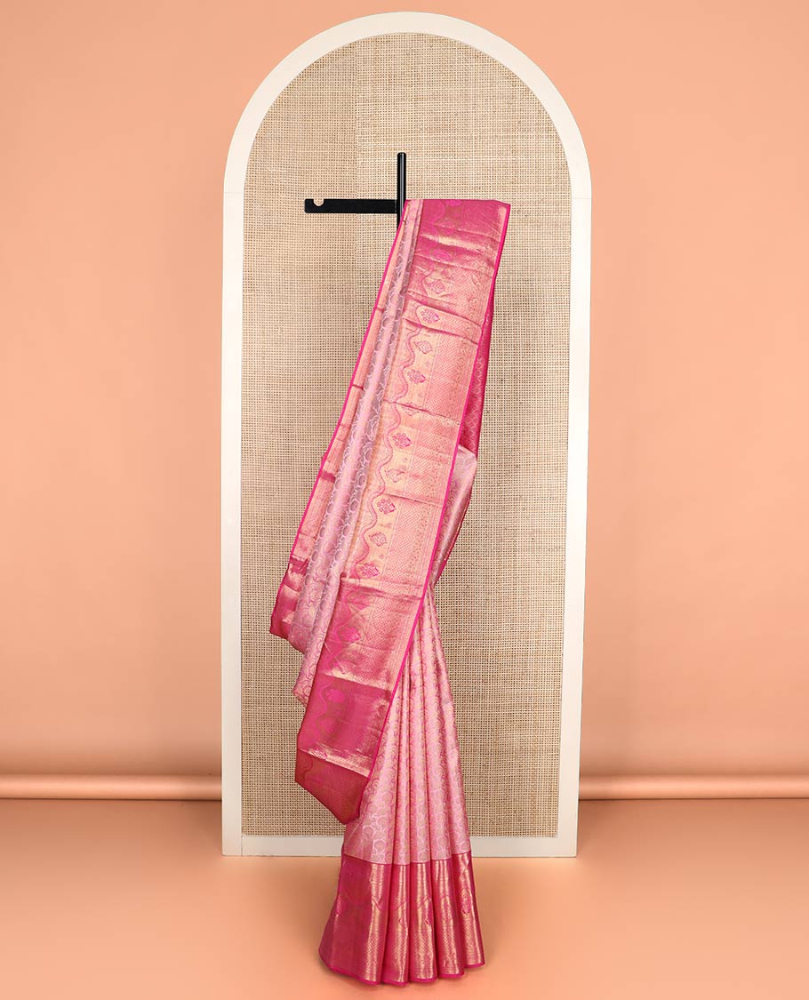 Pink floral jaal jacquard Kanchipuram wedding silk saree, contrast border steeped with traditional zari designs, and zari-rich jaal pallu