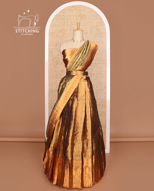 Brown buttas tissue half saree with contrast zari design border, checked design blouse & floral design dhavani