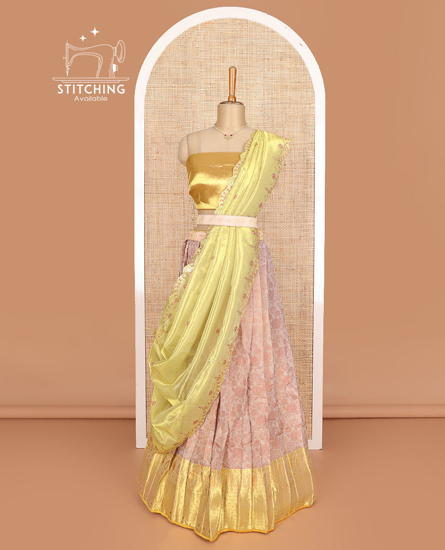 Pastel pink art silk half-saree, floral vine with contrast traditional border skirt, brocade blouse, scallop embroidered dhavani, and detachable belt