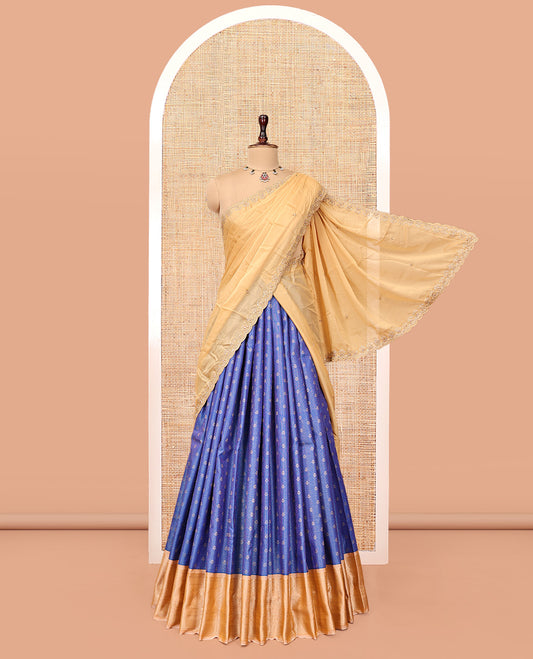 Blue Art Silk Half-Saree Pavadai Material Features a Zari-Buttas Skirt, a Contrast Traditional Border, Contrast Blouse, and Scallop Embroidered Dhavani