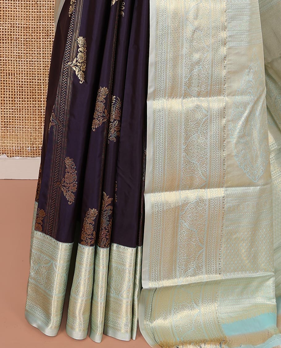 Navy Blue Budget Silk Saree, Embellished with Zari Buttas All Over Its Body, Complemented by a Contrast Traditional Zari Designs Woven Border, Pallu of Intricate Designs, and Paired with a Contrast Blouse