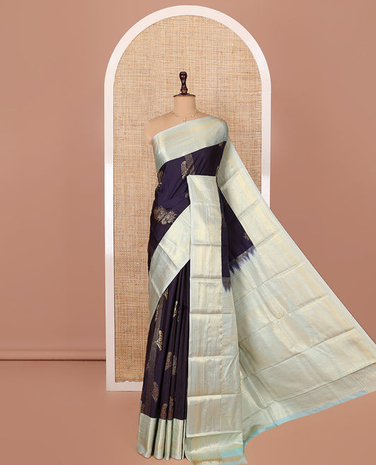Navy Blue Budget Silk Saree, Embellished with Zari Buttas All Over Its Body, Complemented by a Contrast Traditional Zari Designs Woven Border, Pallu of Intricate Designs, and Paired with a Contrast Blouse