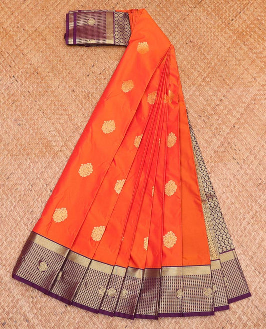 Orange Budget Silk Saree, Embellished with Zari Buttas All Over Its Body, Complemented by a Contrast Checked Zari Border of Peacock-Chakram Designs, Intricately Designed Pallu, and Paired with a Contrast Blouse