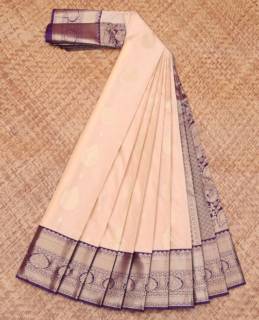 Pale Peach Budget Silk Saree, Woven with Zari Buttas All Over Its Body, Complemented by a Contrast Traditional Zari Design Border, Grand Jaal-Patterned Pallu, and Paired with a Contrast Blouse