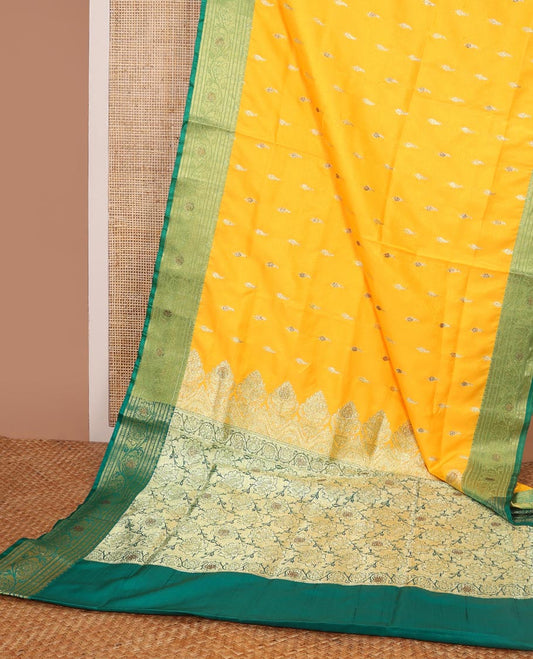 Orange buttas semi banaras nylon with contrast floral design border & floral jaal design pallu