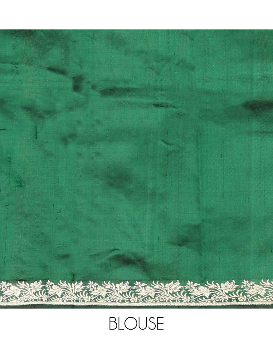 Dark green buttas kathan silk saree, floral creeper border, and Mughal-style floral jaal pallu