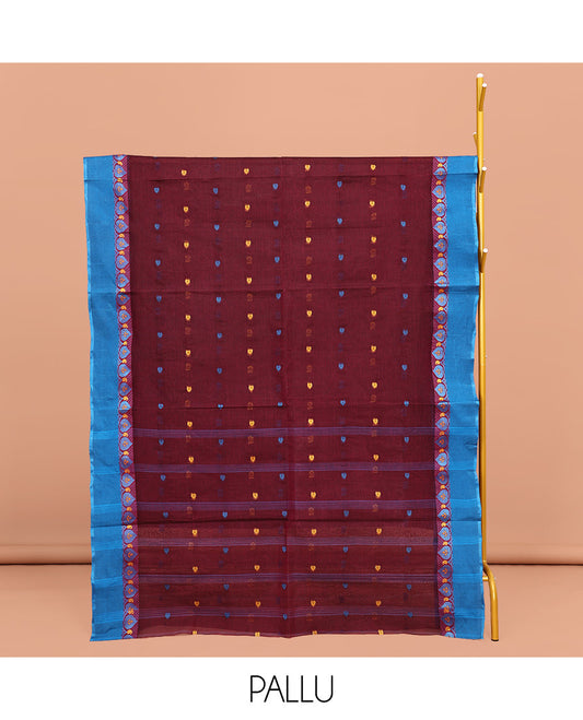 Maroon Bengal Cotton Saree, Embellished with Thread Buttas All Over Its Body, Complemented by a Contrast Border of Leaf Designs, Pallu of Stripes and Buttas, and Paired with a Matching Blouse