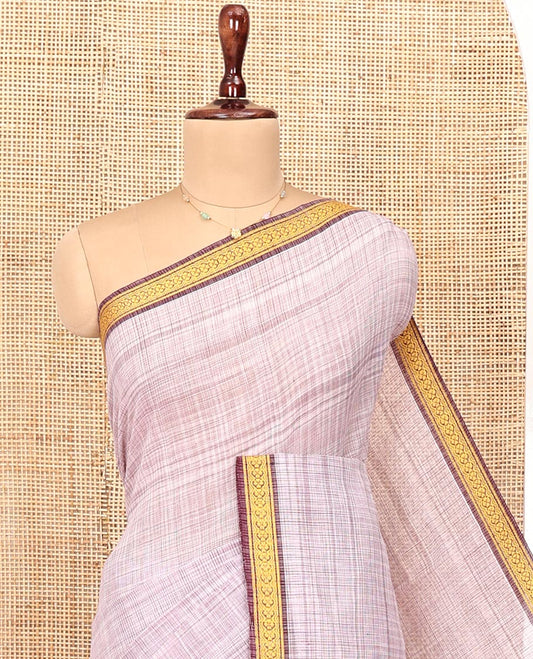Pale Purple Andhra Cotton Saree, Sparsely Textured Heathered Patterns All Over Its Body, Complemented by Contrast Traditional Border, Pallu Steeped with Stripes, and Paired with a Matching Blouse