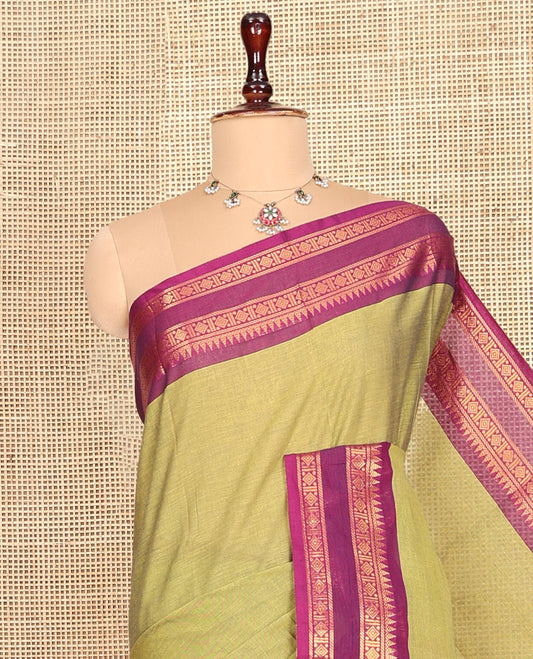 Green Plain Chettinad Cotton Saree, Complemented by a Contrast Rettai Pettu Traditional Zari Border, Striped Pallu, and a Matching Blouse