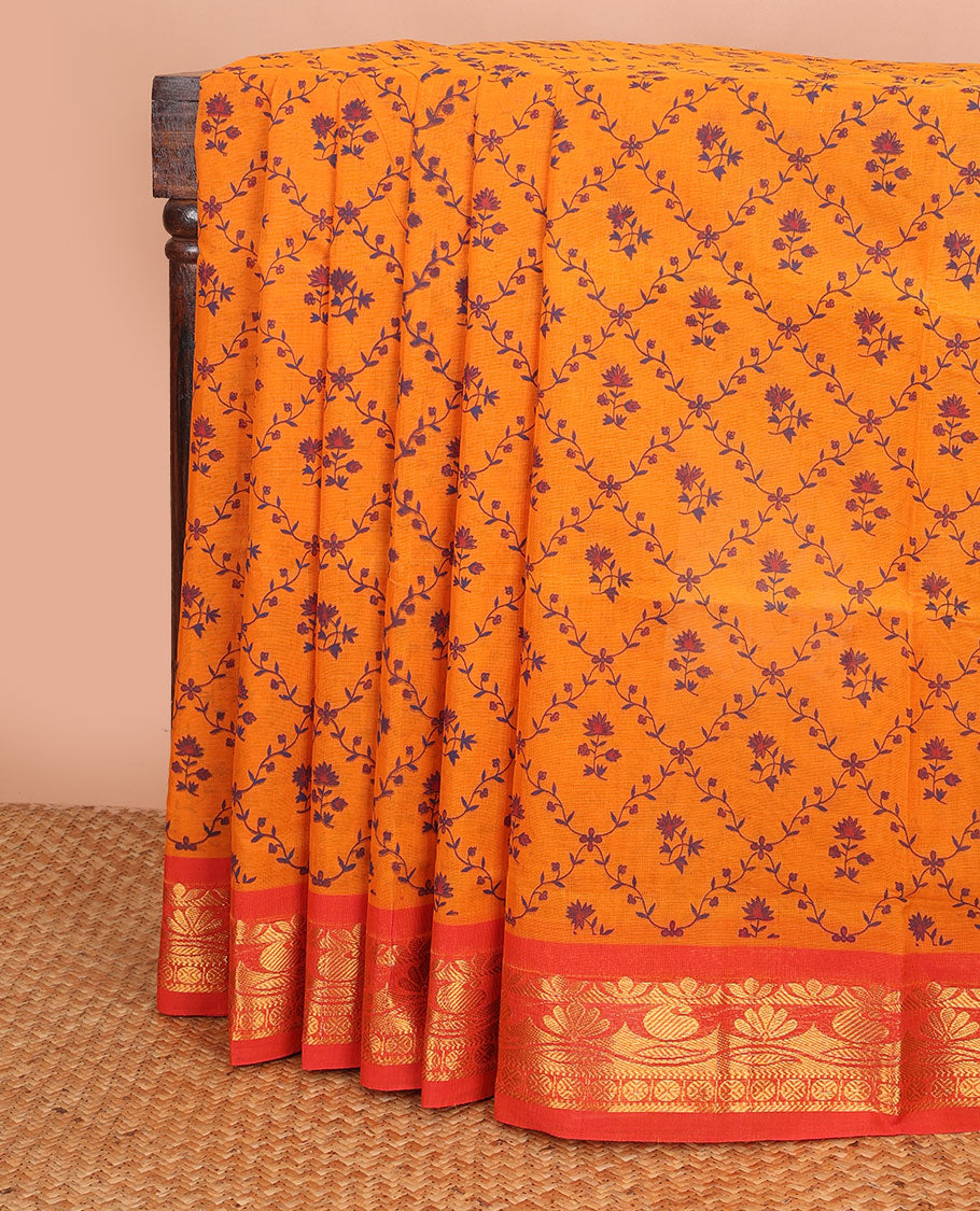 Orange floral butta enclosed jaal printed Andhra cotton saree, contrast traditional zari border & pallu of paisley print & zari stripes
