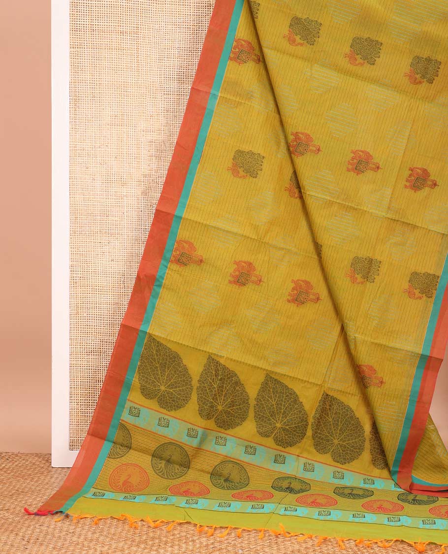 Green geometric and animal motifs printed Coimbatore cotton saree, contrast border, and pallu of elephant, peacock and leaf motifs