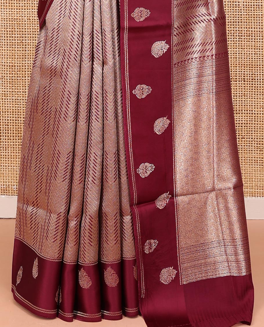Magenta Pink Russian Dola Silk Saree, Gracefully Embellished with Zari Zig-Zag Jacquard on Its Body, Highlighted by Zari Buttas Woven Satin Border, Intricately Designed Pallu, and Paired with a Matching Blouse