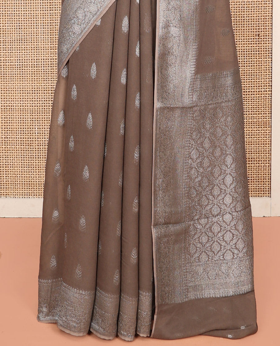 Brown Georgette Saree, Steeped with Buttas, Highlighted by a Traditional Floral Creeper Border, Intricately Designed Pallu, and  a Matching Blouse