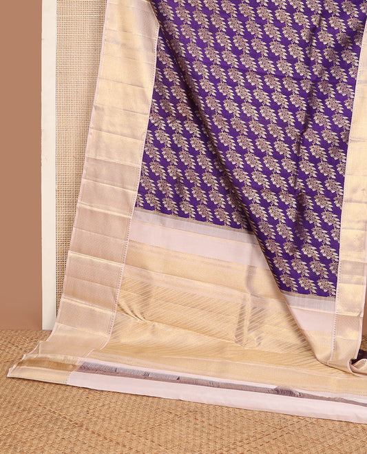 Violet floral jacquard silk saree, contrast diagonal floral striped pallu & zari border of rekku, muthu & jaal design
