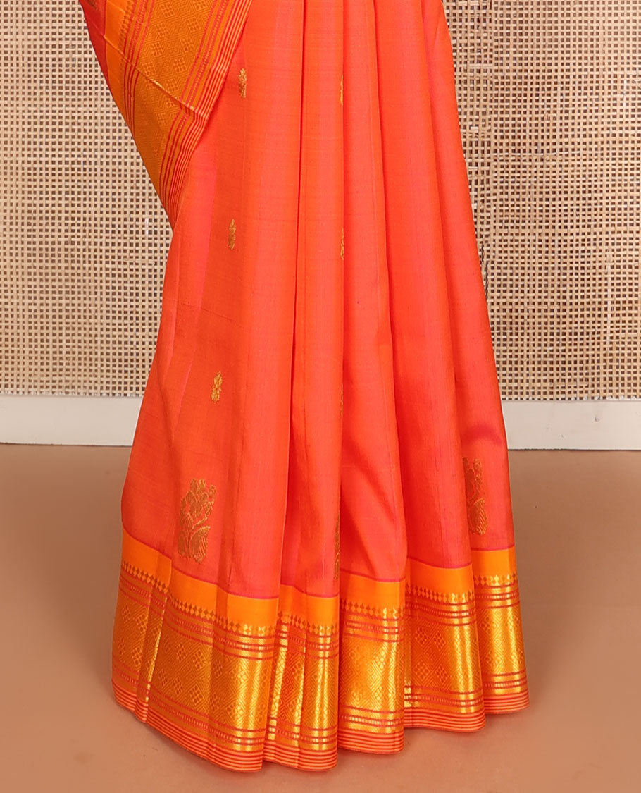Orange zari buttas kanchipuram silksaree, contrast one-sided border of paneer sombu,banaras,muthu & jaal & floral design pallu