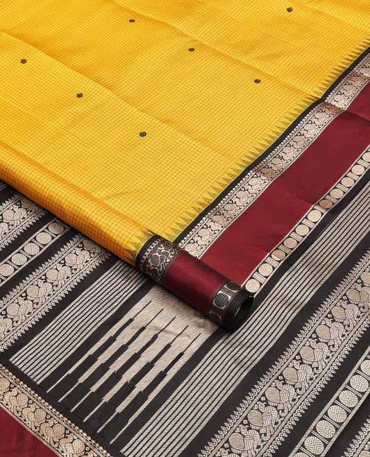 Yellow micro-checked & buttas kanchipuram silk saree, contrast rettai pettu border of salngai,banaras,mayil & rudraksham & seppu rekku pallu