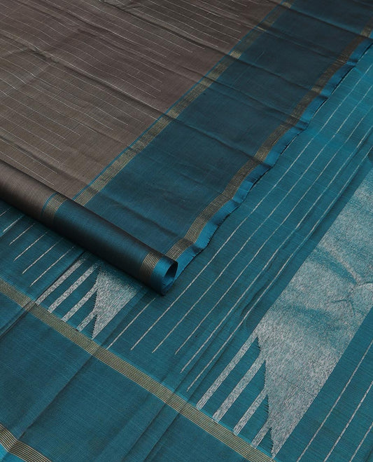 Dark grey striped Kanchipuram silk saree, contrast rettai pettu striped border, and temple zari pallu