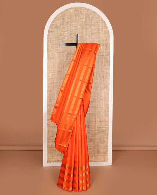 Orange zari buttas Kanchipuram silks saree, zari border of thilakam, muthu, yaanai, mayil, and kuthirai, and jaal pallu