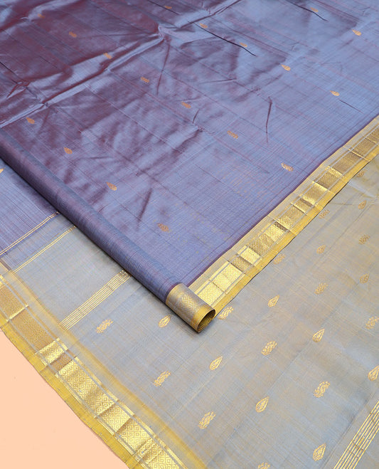 Grey Kanchipuram Silk Saree, Featuring Zari Buttas All Over Its Body, Complemented by a Contrast One-Sided Border of Banaras, and Mayil Kann Designs, Pallu of Zari Designs, and Comes Without a Blouse