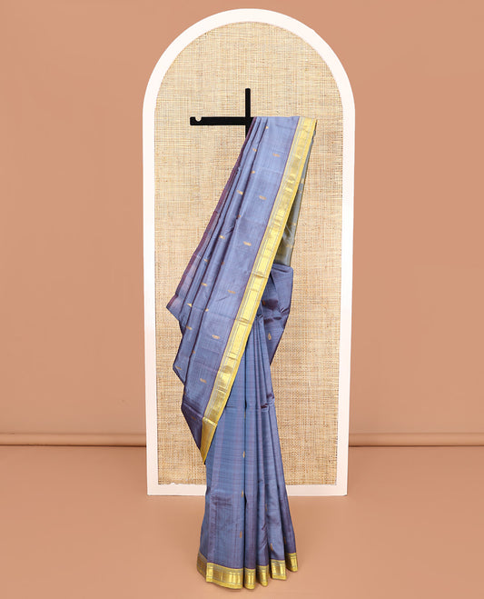 Grey Kanchipuram Silk Saree, Featuring Zari Buttas All Over Its Body, Complemented by a Contrast One-Sided Border of Banaras, and Mayil Kann Designs, Pallu of Zari Designs, and Comes Without a Blouse