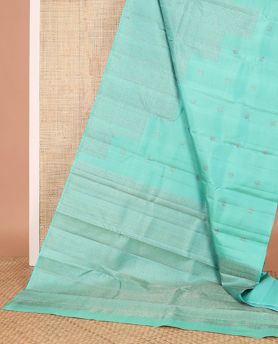 Borderless turquoise mayil and floral design Kanchipuram designer saree, zari-rich jaal pallu