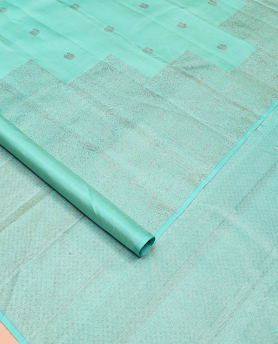 Borderless turquoise mayil and floral design Kanchipuram designer saree, zari-rich jaal pallu