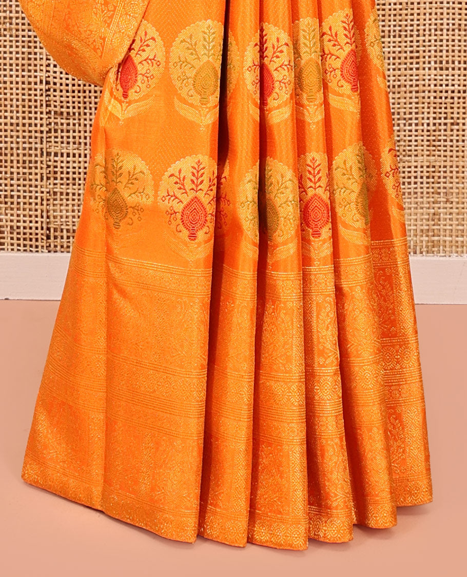 Orange Kanchipuram Designer Silk Saree, Subtly Sparkled With Floral Jacquard Design On Its Body, Highlighted by Meenakari Mughal Intricate Border, Intricate Pallu and Paired with a Matching Blouse