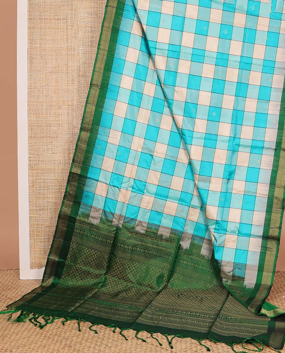 Multi-color bold checked soft silk saree, contrast Vaira Oosi border, and pallu of geometric patterns