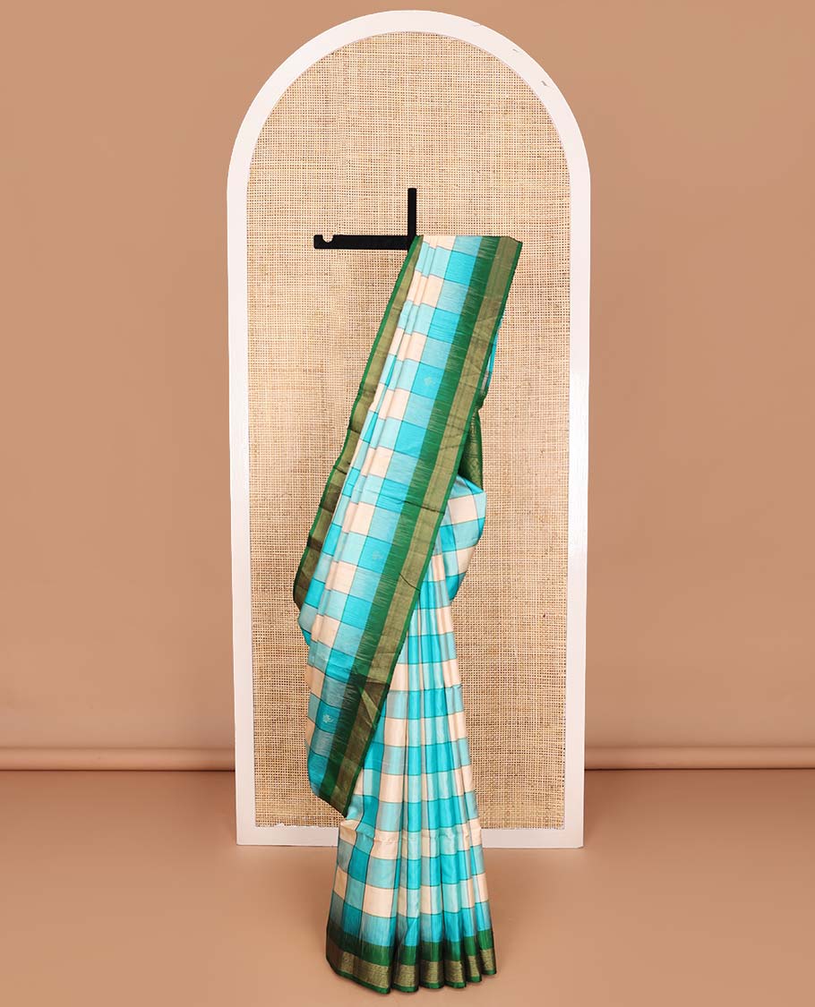 Multi-color bold checked soft silk saree, contrast Vaira Oosi border, and pallu of geometric patterns