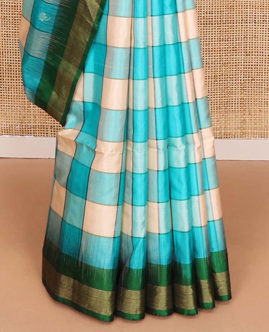 Multi-color bold checked soft silk saree, contrast Vaira Oosi border, and pallu of geometric patterns