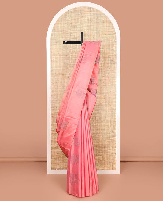 Borderless pink soft silk saree features manga and rudraksham motifs, and self-pallu steeped with manga and rudraksham motifs