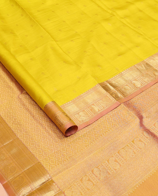 Yellow zari buttas nine-yard saree, contrast zari border of thilakam,banaras,muthu & manga & mayil designs & ogee patterned pallu