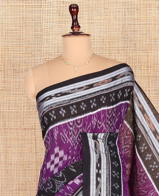 Purple Odisha Cotton Saree, Ornamented with Intricate Ikkat Design Weave on Its Body, Complemented by a Contrast Ikkat Border, Pallu of Intricate Ikkat Weave, and Comes Without a Blouse