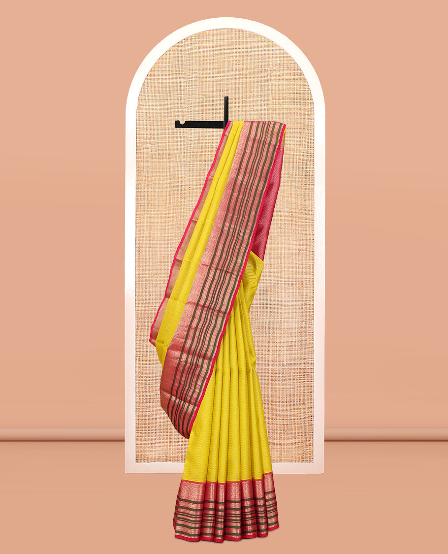 Yellow Vasundhara Silk Saree Adorned with Muthu Stripes All Over Its Body, Contrast Border of Thilakam Mokku, Muthu, Banaras, Mayil, Kamalam, and Neli Designs, Intricate Pallu, and Paired with a Contrast Blouse