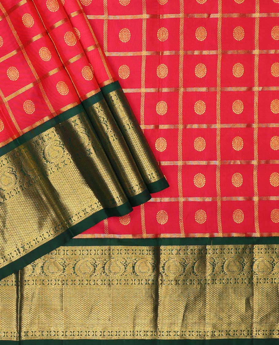 Red pure silk half-saree, chakram enclosed zari checked skirt, contrast border of muthu, poun, arumbu manga and mayil kann, and contrast zari design blouse, and leaf jaal dhavani