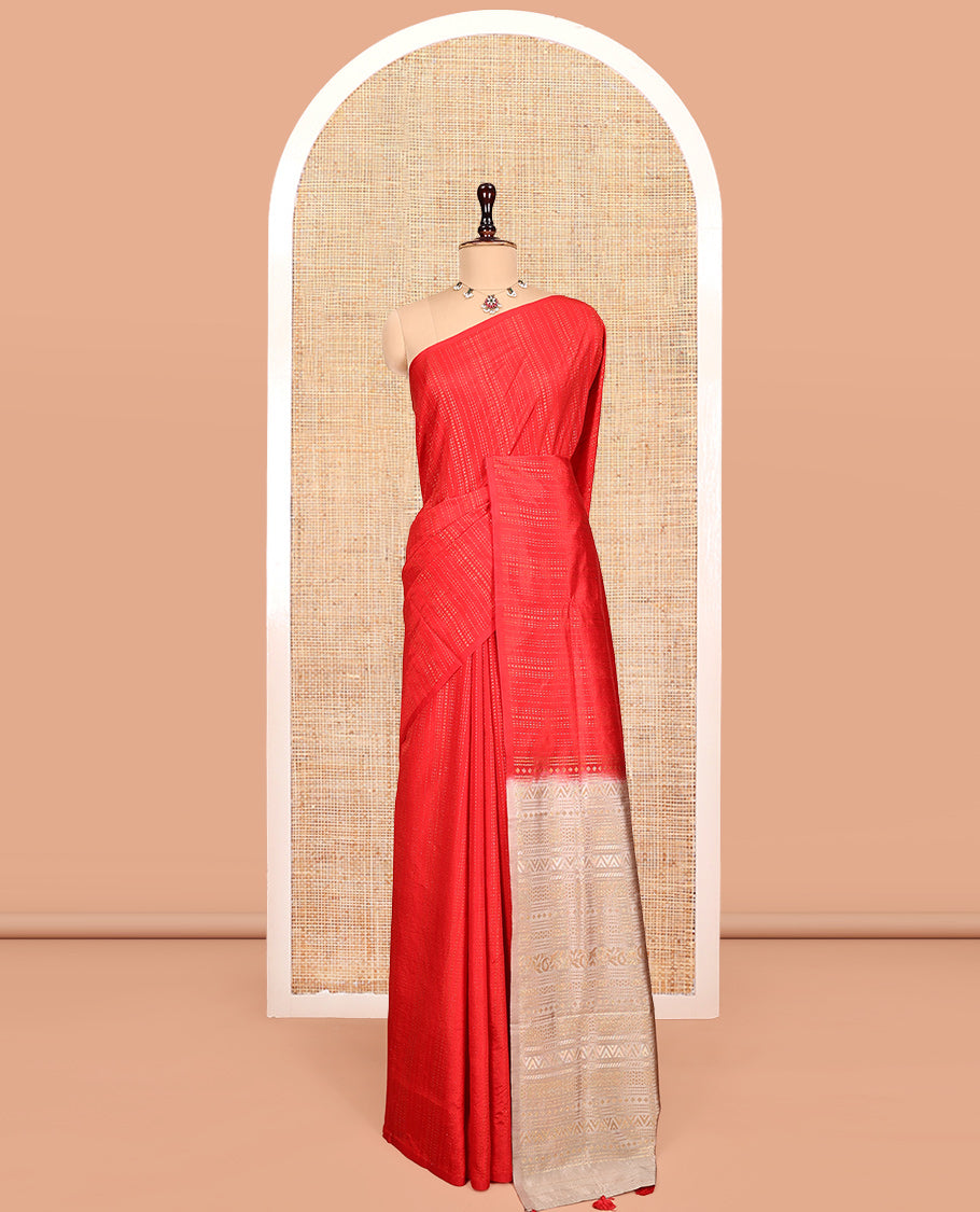 Borderless Red Matka Silk Saree, Steeped with Zari Stripes All Over Its Body, Complemented by a Contrast Pallu of Geometric Zari Designs, and Paired with Contrast Blouse