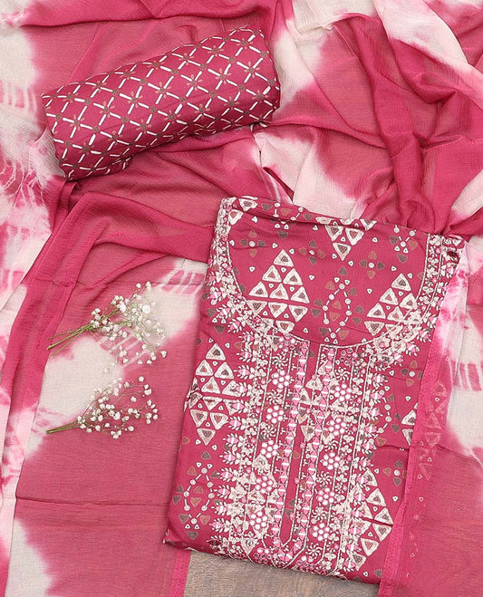 Pink material chudidar set, geometric with neck embroidered top, jaal printed bottom, and shibori dyed dupatta