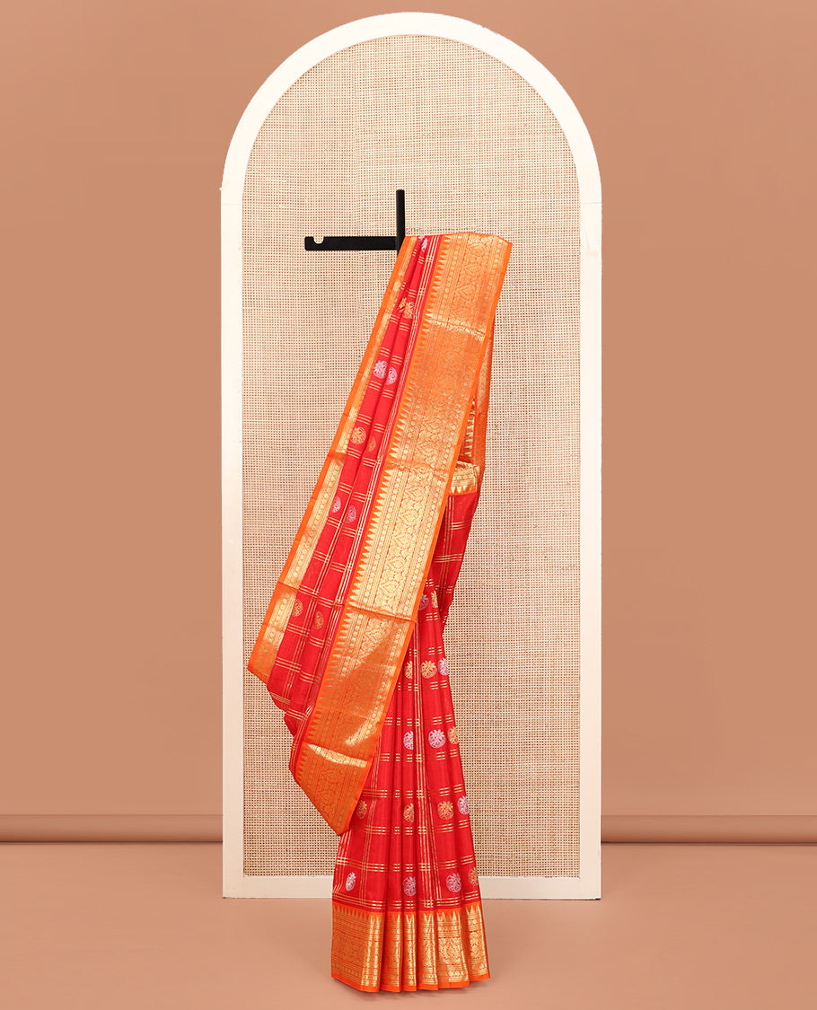 Red Venkatagiri Silk Saree, Enriched with Zari Butta Enclosed Checks All Over Its Body, Complemented by a Contrast Temple Border of Traditional Designs, Grand Pallu of Jaal Designs, and Paired with a Contrast Blouse