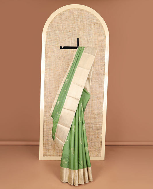Green buttas vasundhara elite silk saree with contrast floral design border & intricate zari design pallu