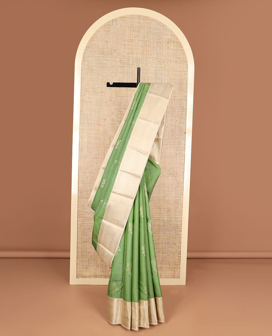 Green buttas vasundhara elite silk saree with contrast floral design border & intricate zari design pallu
