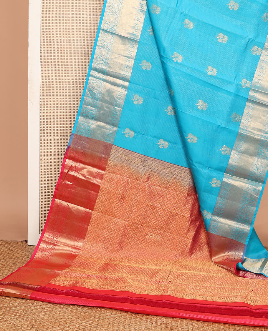 Blue zari buttas & striped Vasundhara silk mix saree, zari border of thilakam, rudraksham, cross kamalam & manga & contrast jaal pallu