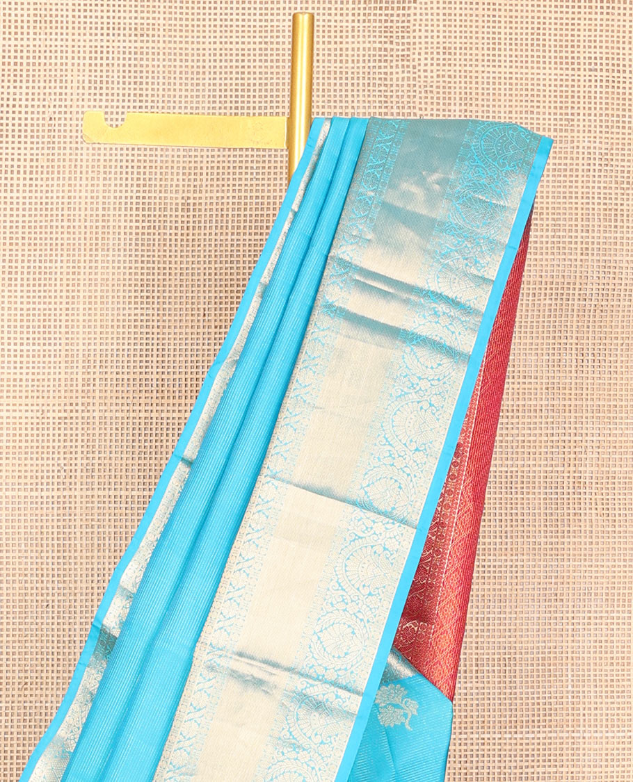 Blue zari buttas & striped Vasundhara silk mix saree, zari border of thilakam, rudraksham, cross kamalam & manga & contrast jaal pallu