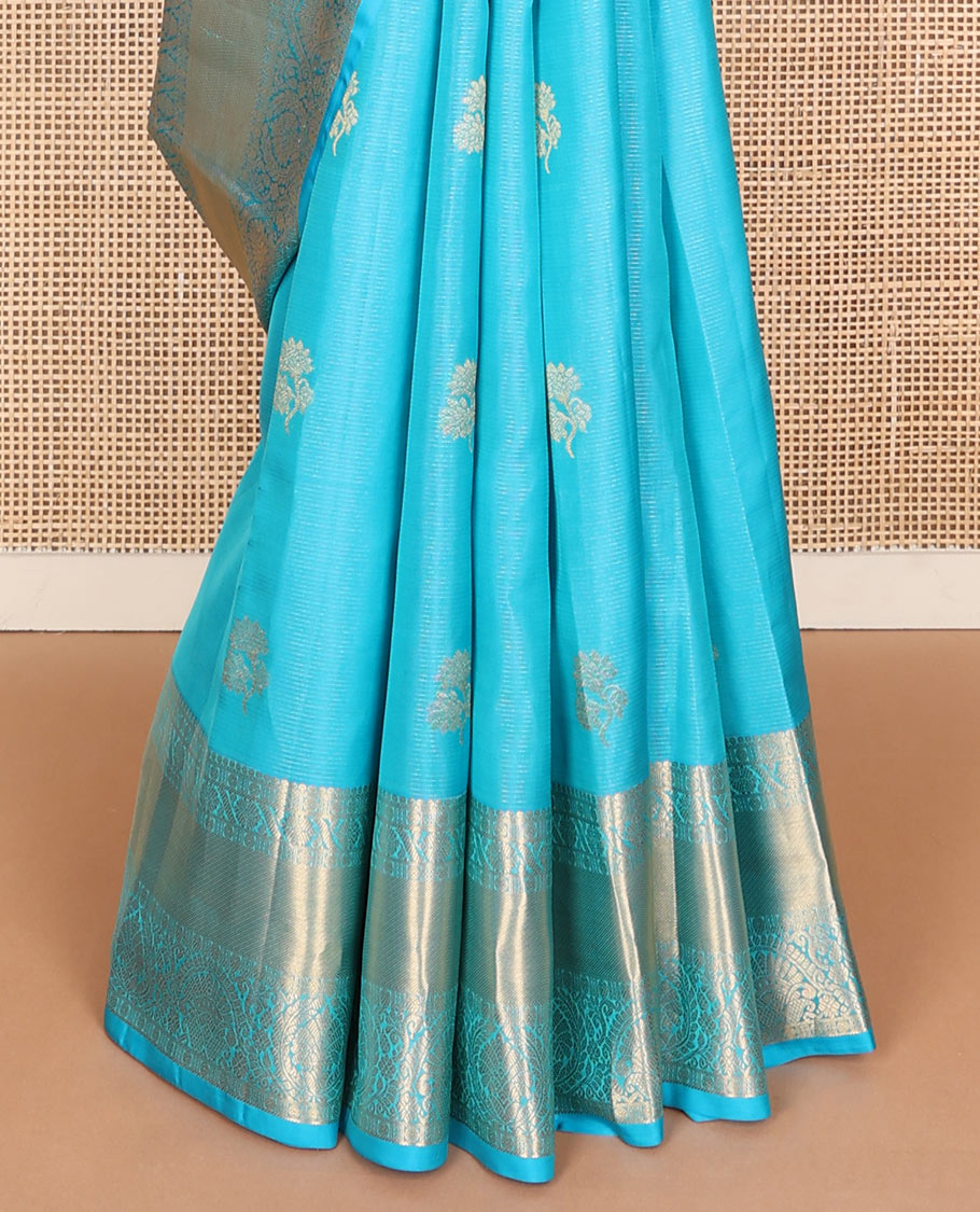 Blue zari buttas & striped Vasundhara silk mix saree, zari border of thilakam, rudraksham, cross kamalam & manga & contrast jaal pallu