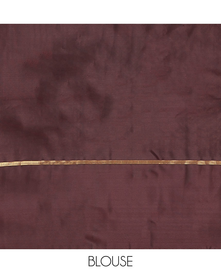 Green Vasundhara Lite-Silk Mix Saree Features Zari Stripes, Complemented with a Contrast Rettai Pettu Neli Striped Border, a Majestically Detailed Pallu with Jaal Designs, and a Contrast Blouse