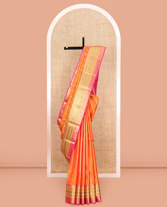 Orange Vasundhara Lite Silk Mix Saree, Accentuated With Zari Stripes On Its Body, Complemented by Contrast Meenakari-style Zari Woven Border, Grand Jaal Pallu and Paired with a Contrast Blouse