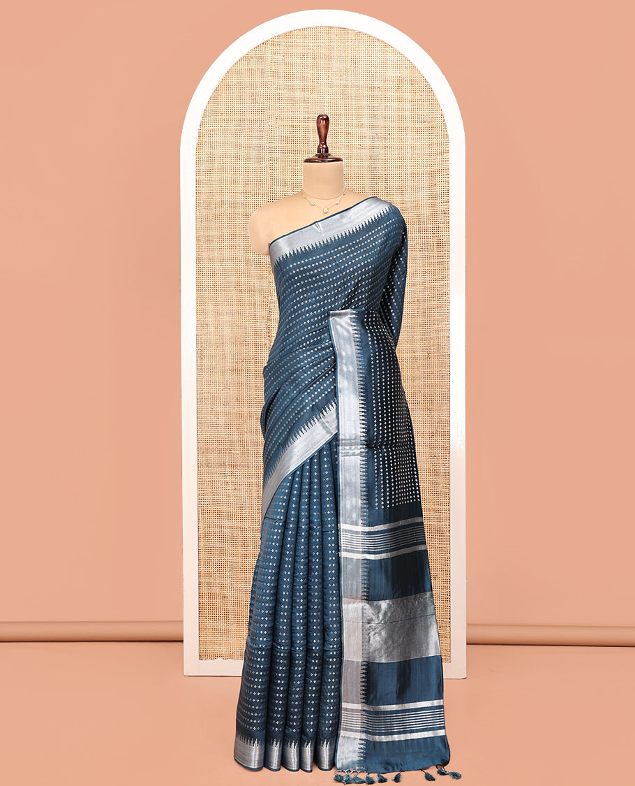 Blue Banana Pith Saree, Steeped with Buttas All Over Its Body, Highlighted by Temple Zari Border, Pallu of Gleaming Zari Stripes, and Paired with a Matching Blouse