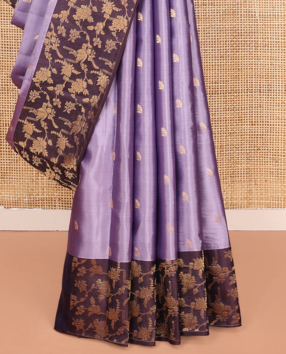 Lavender Vasundhara Silk Saree, Ornamented with Zari Buttas on Its Body, Complemented by Contrast Zari Border of Floral Jaal Designs, Gracefully Embellished Pallu of Floral Jaal Designs, and Paired with a Contrast Blouse