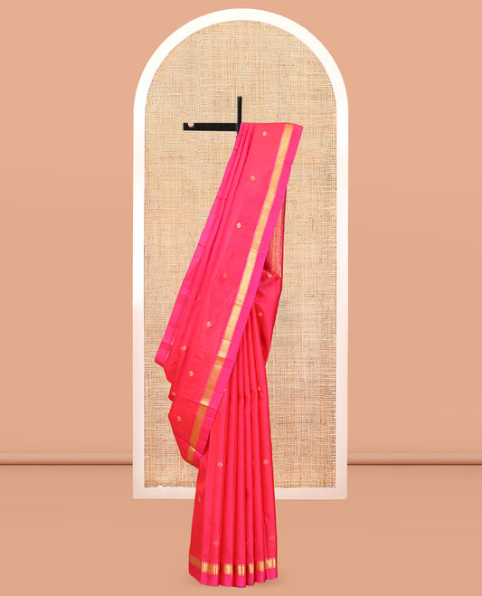 Pink Vasundhara Silk Saree, Subtly Sparkled with Zari Buttas, a Kal Eragina Border of Muthu Designs, Geometric Patterned Pallu, and a Matching Blouse