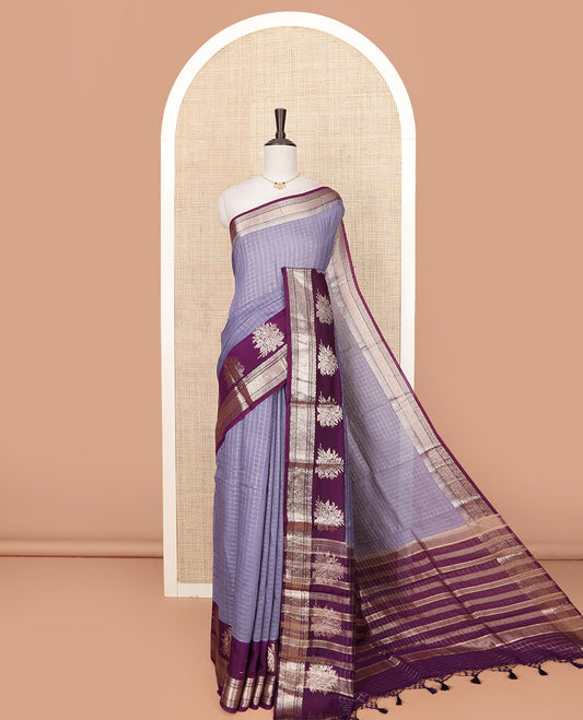 Grey Assam Silk Saree Beautifully Bedecked with Zari Checks, Complemented by Contrast Traditional Zari Border of Floral Designs, a Captivating Pallu of Zari Stripes, and Paired with a Contrast Blouse
