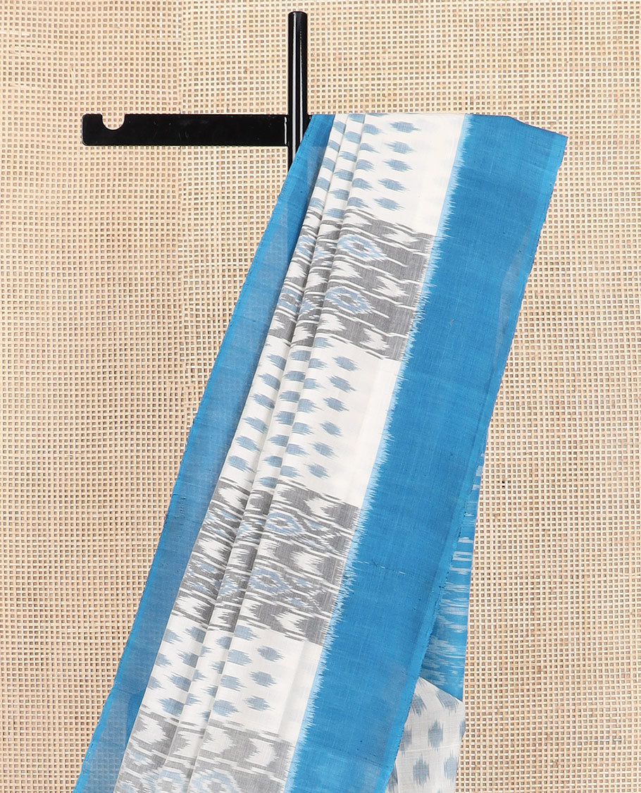 Half-white geometric design Pochampally ikkat saree, contrast plain border, and ikkat design pallu